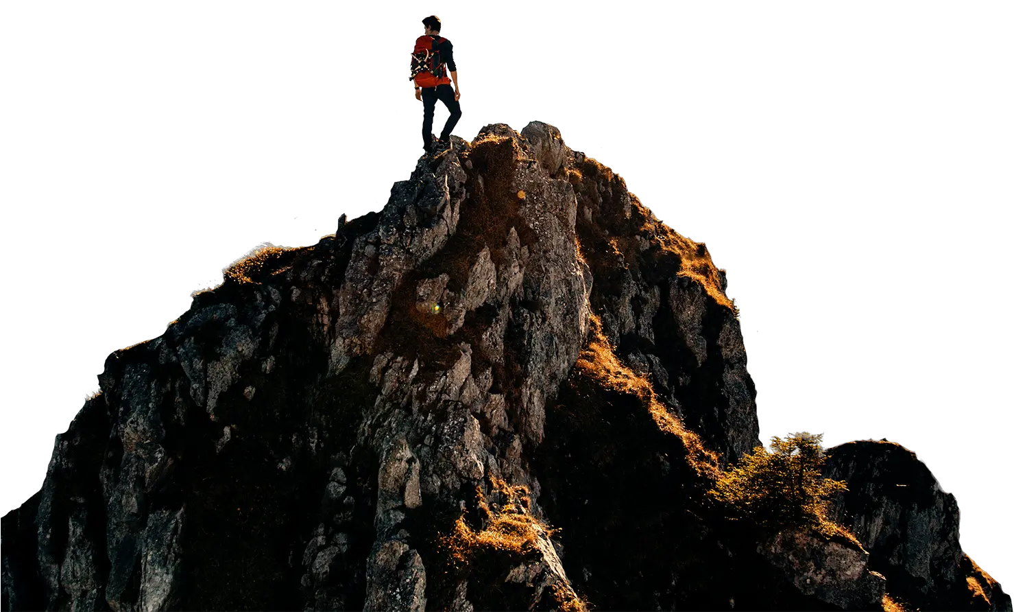 A Young Man Reaching The Top Of The Mountain